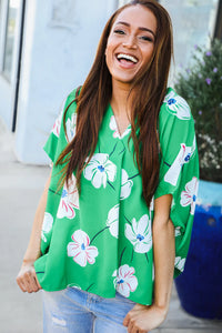 GREEN FLORAL WOVEN VNECK DOLMAN TOP-PLUS