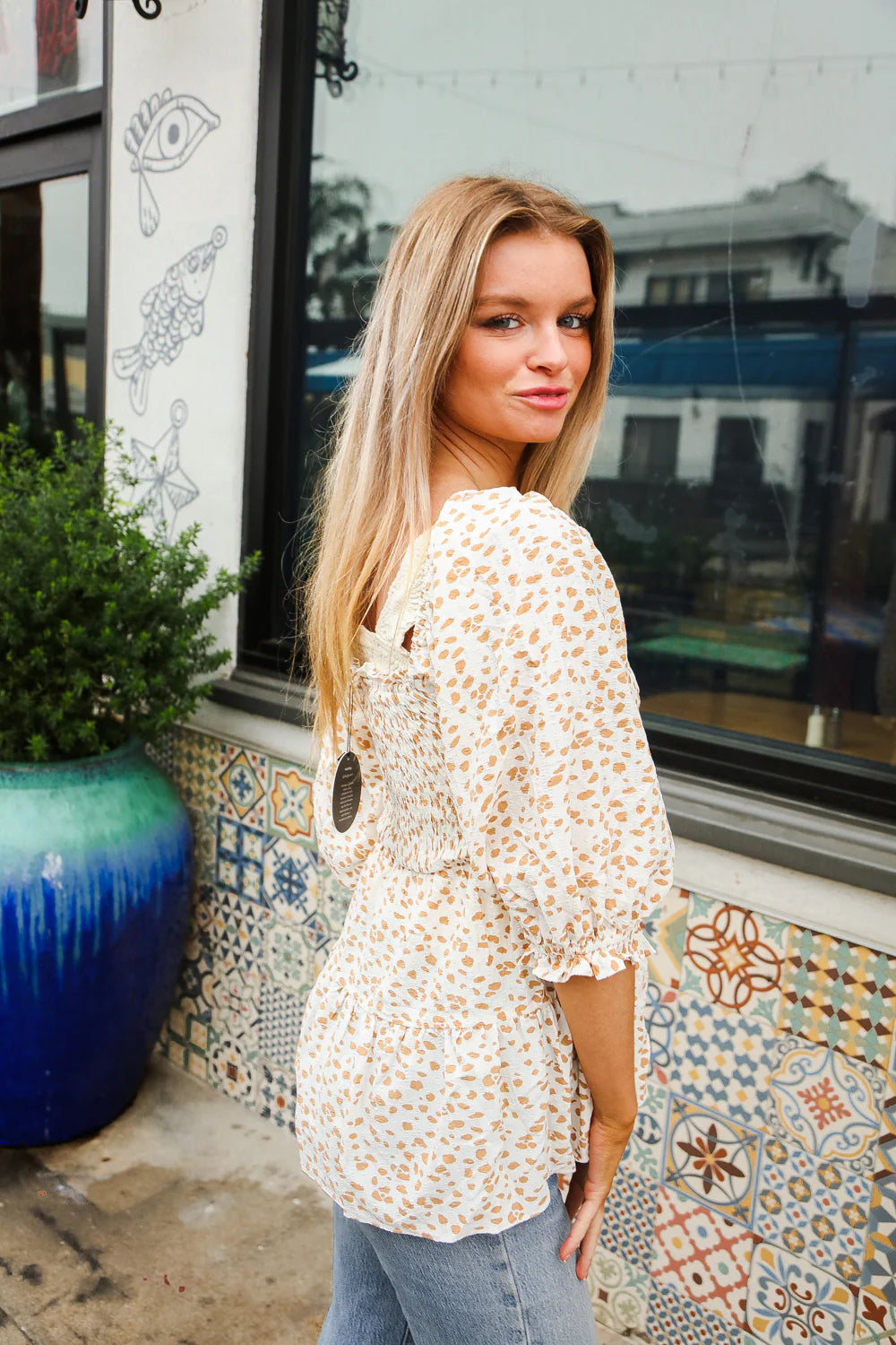 IVORY TAUPE ANIMAL PRINT SMOCKED BABYDOLL FIT & FLARE BLOUSE