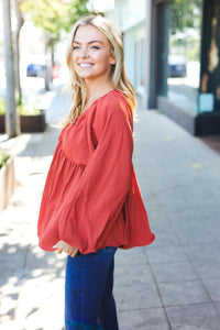 RUST SWEETHEART VNECK WOVEN BABYDOLL LONG SLEEVE BUBBLE TOP