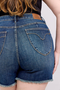 DARKWASH TUMMY CONTROL HIGH WAIST FRAYED HEM SHIELD BACK POCKETS SHORTS JUDY BLUE DENIM-PLUS