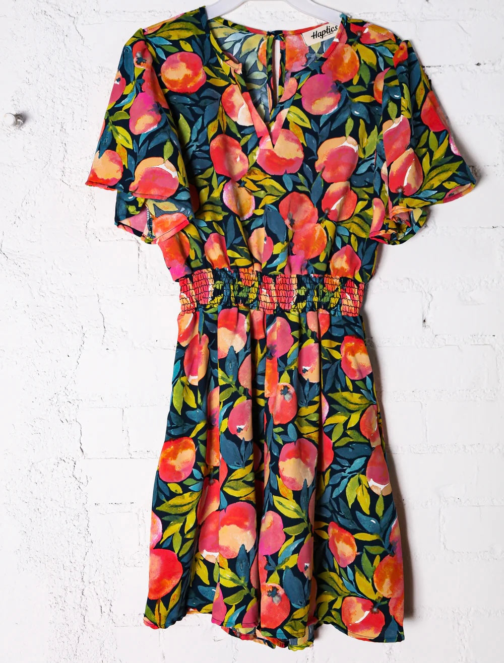 NAVY CORAL OLIVE MUSTARD FLORAL SMOCKED WAIST VNECK ROMPER