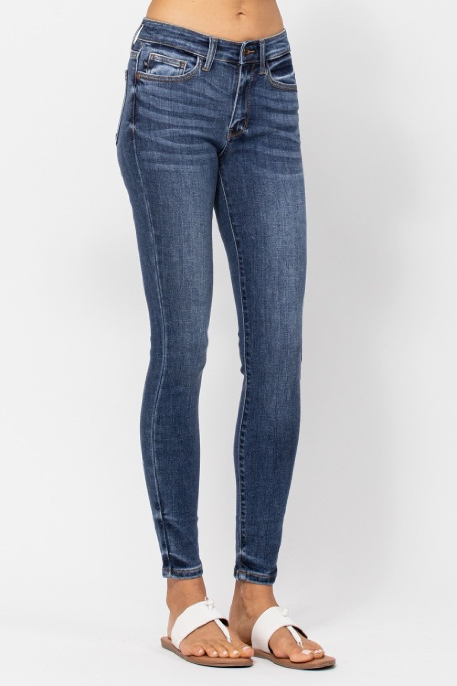 MEDIUM WASH MID RISE SKINNY WITH HANDSANDING JUDY BLUE DENIM