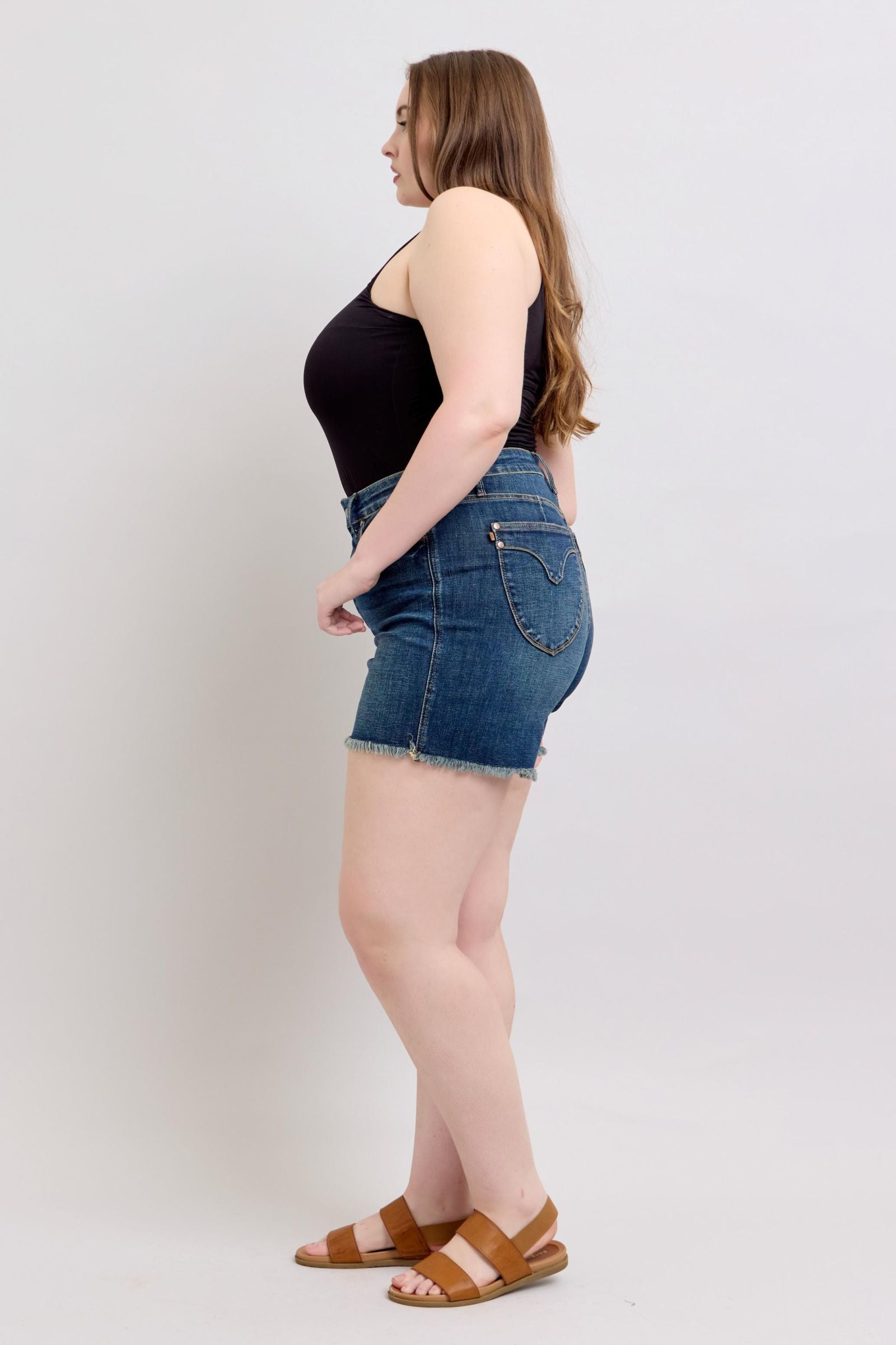 DARKWASH TUMMY CONTROL HIGH WAIST FRAYED HEM SHIELD BACK POCKETS SHORTS JUDY BLUE DENIM-PLUS