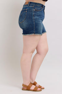 DARKWASH TUMMY CONTROL HIGH WAIST FRAYED HEM SHIELD BACK POCKETS SHORTS JUDY BLUE DENIM-PLUS