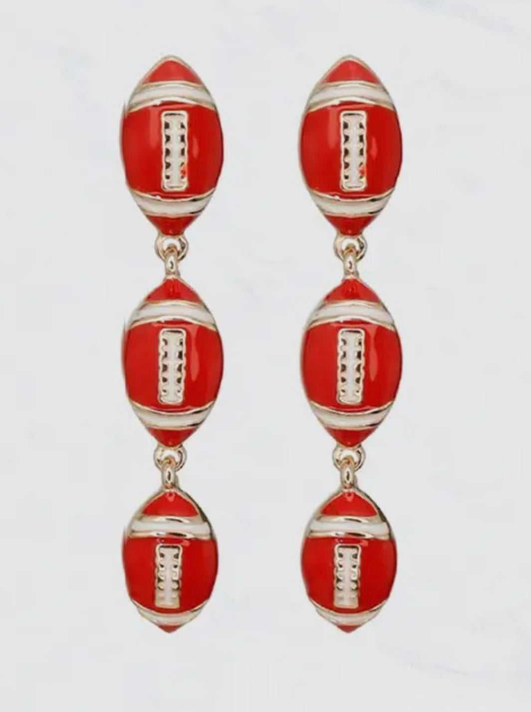 METAL DANGLY FOOTBALL EARRINGS