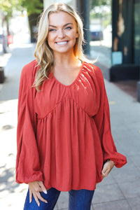 RUST SWEETHEART VNECK WOVEN BABYDOLL LONG SLEEVE BUBBLE TOP