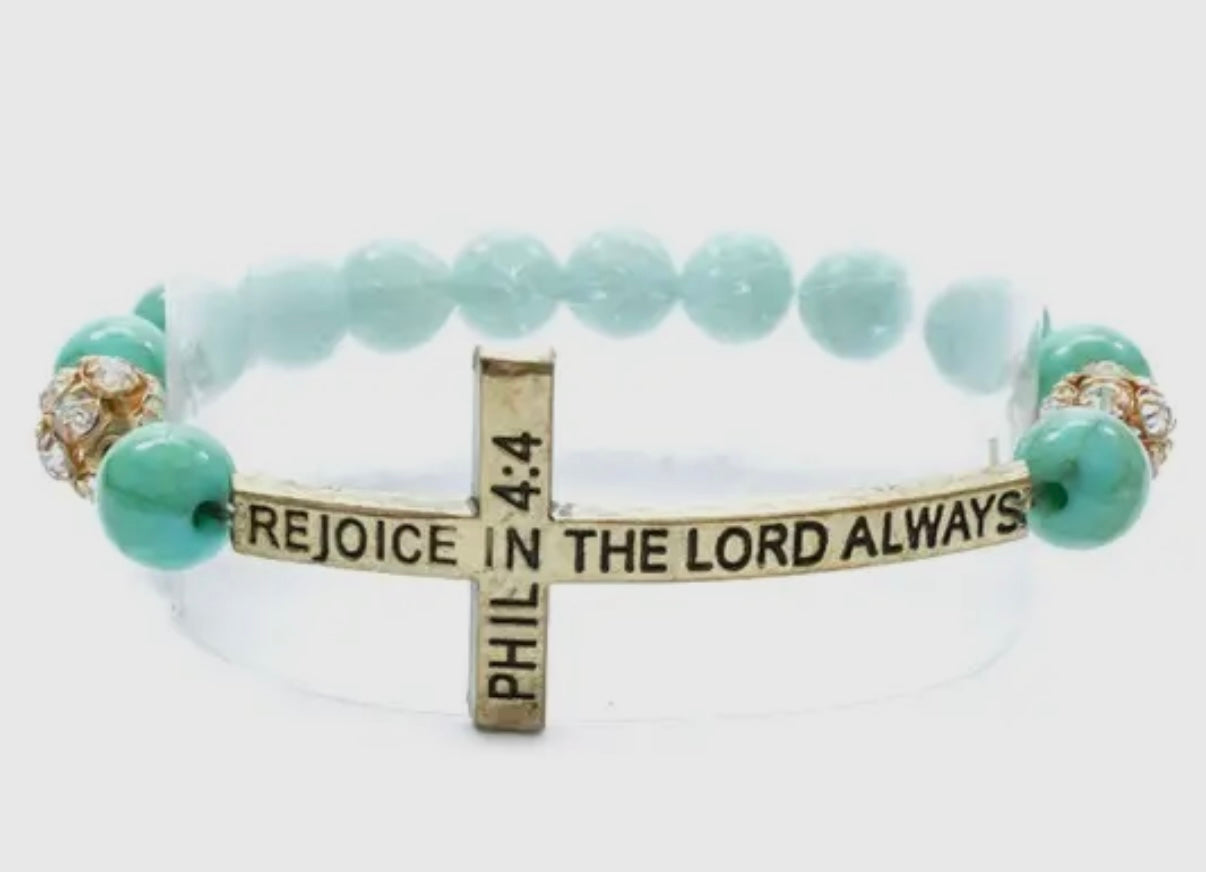 LIGHT BLUE BEADED METAL CROSS BRACELET