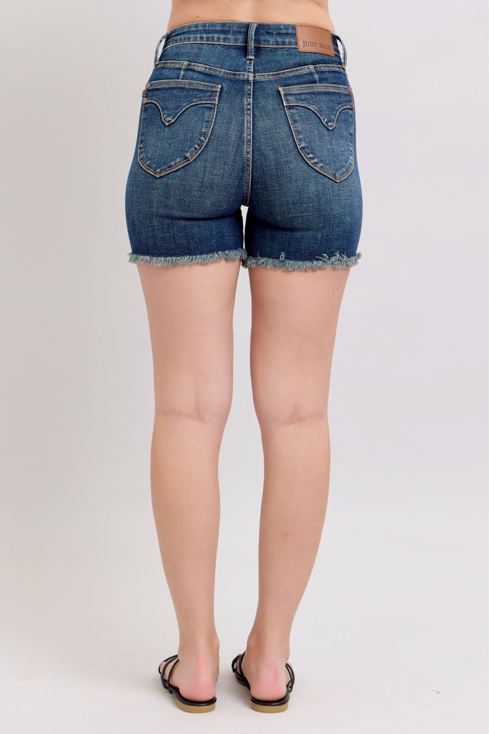 DARKWASH TUMMY CONTROL HIGH WAIST FRAYED HEM SHIELD BACK POCKETS SHORTS JUDY BLUE DENIM-PLUS
