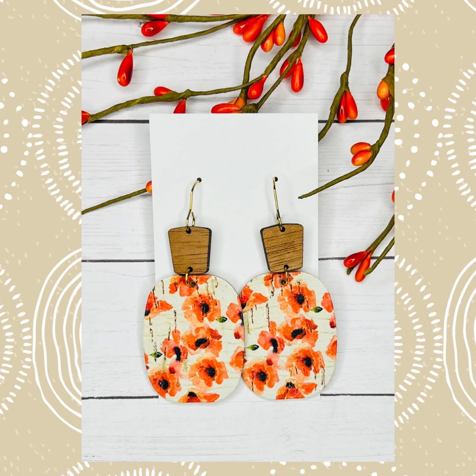 WOOD TOPPERS WITH ORANGE FLORAL PRINT OVALS LEATHER HANDMADE EARRINGS BY B.O.D