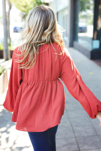 RUST SWEETHEART VNECK WOVEN BABYDOLL LONG SLEEVE BUBBLE TOP