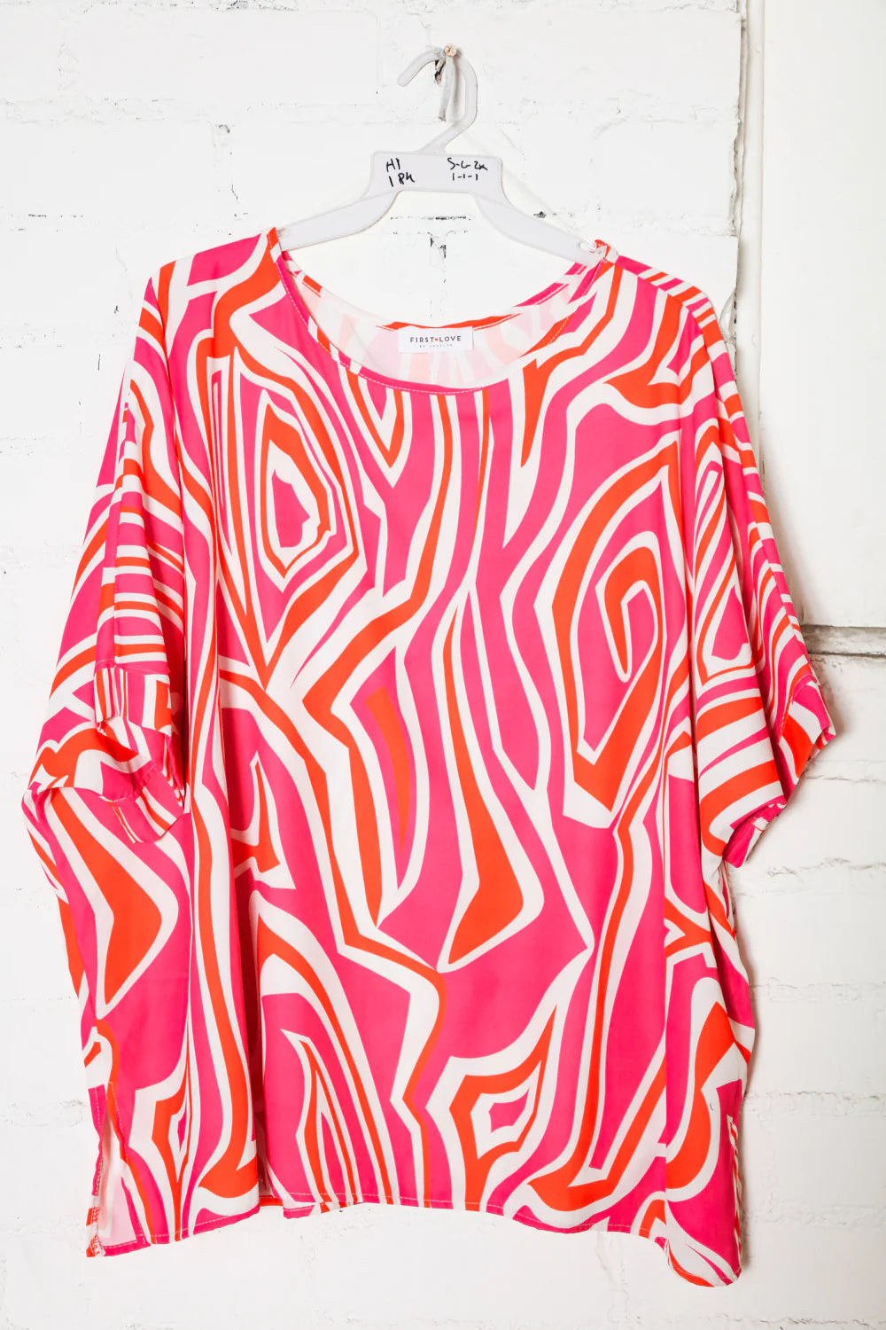 FUCHSIA ORANGE GEOMETRIC DROP SHOULDER WOVEN TOP