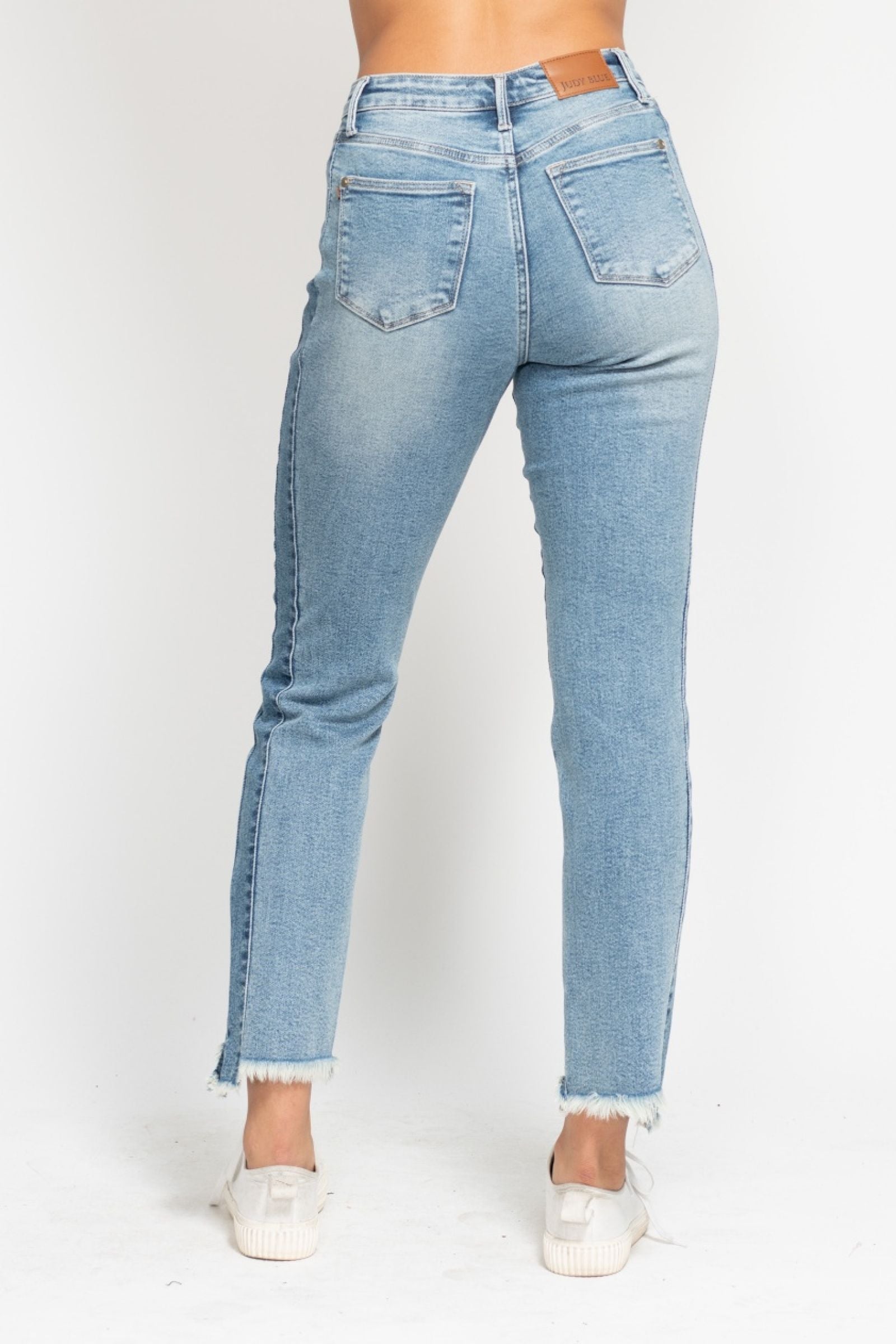 MEDIUM WASH HIGH WAIST VINTAGE WASH SIDE PANEL DETAIL & HI LOW FRAYED HEM SLIM FIT JUDY BLUE DENIM