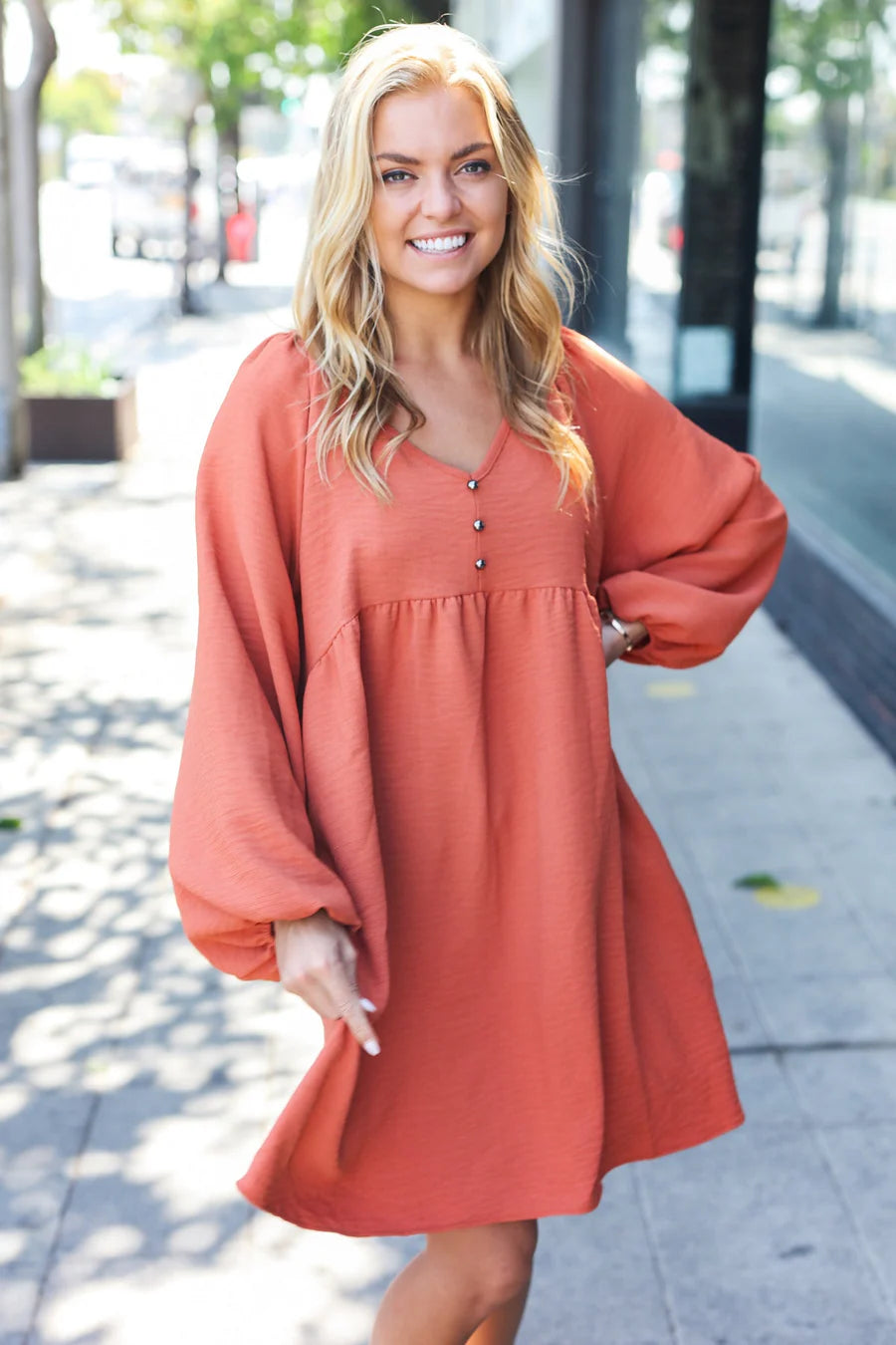 RUST WAFFLE KNIT WOVEN VNECK BABYDOLL DRESS