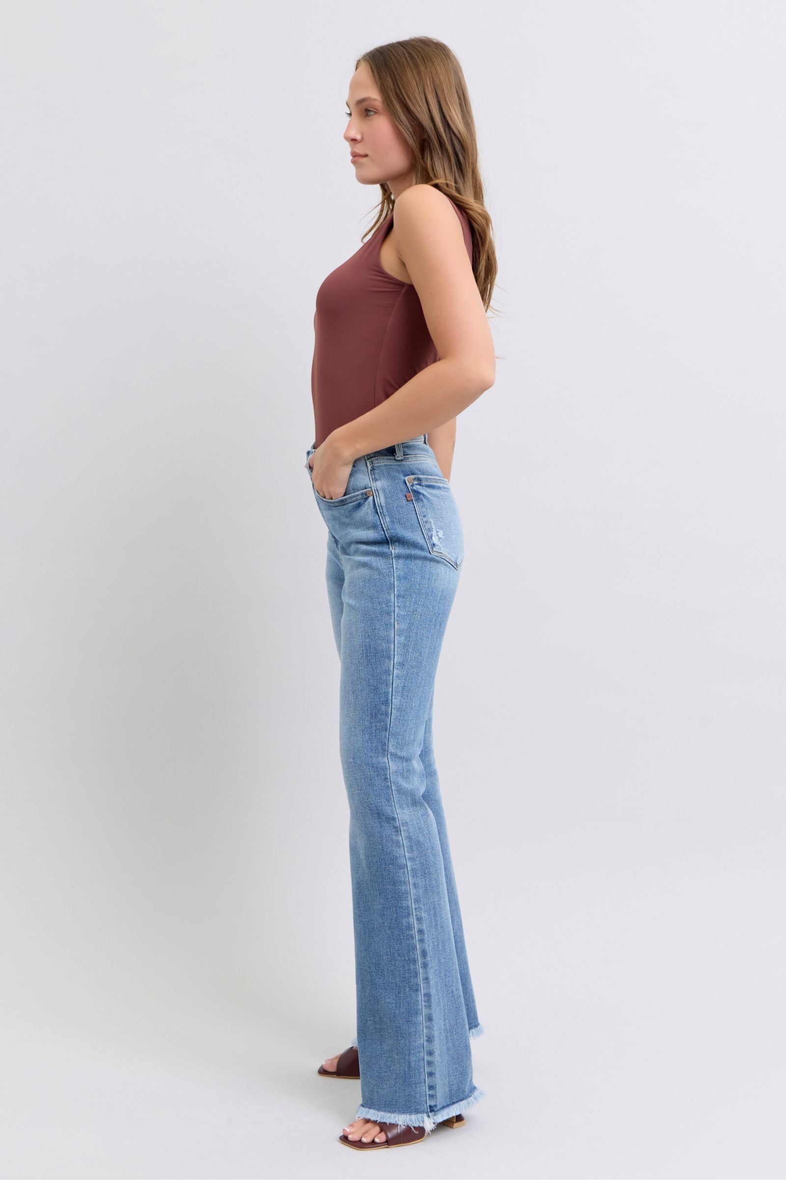 HIGH WAIST MEDIUM WASH BOOTCUT JUDY BLUE DENIM FRAYED HEM