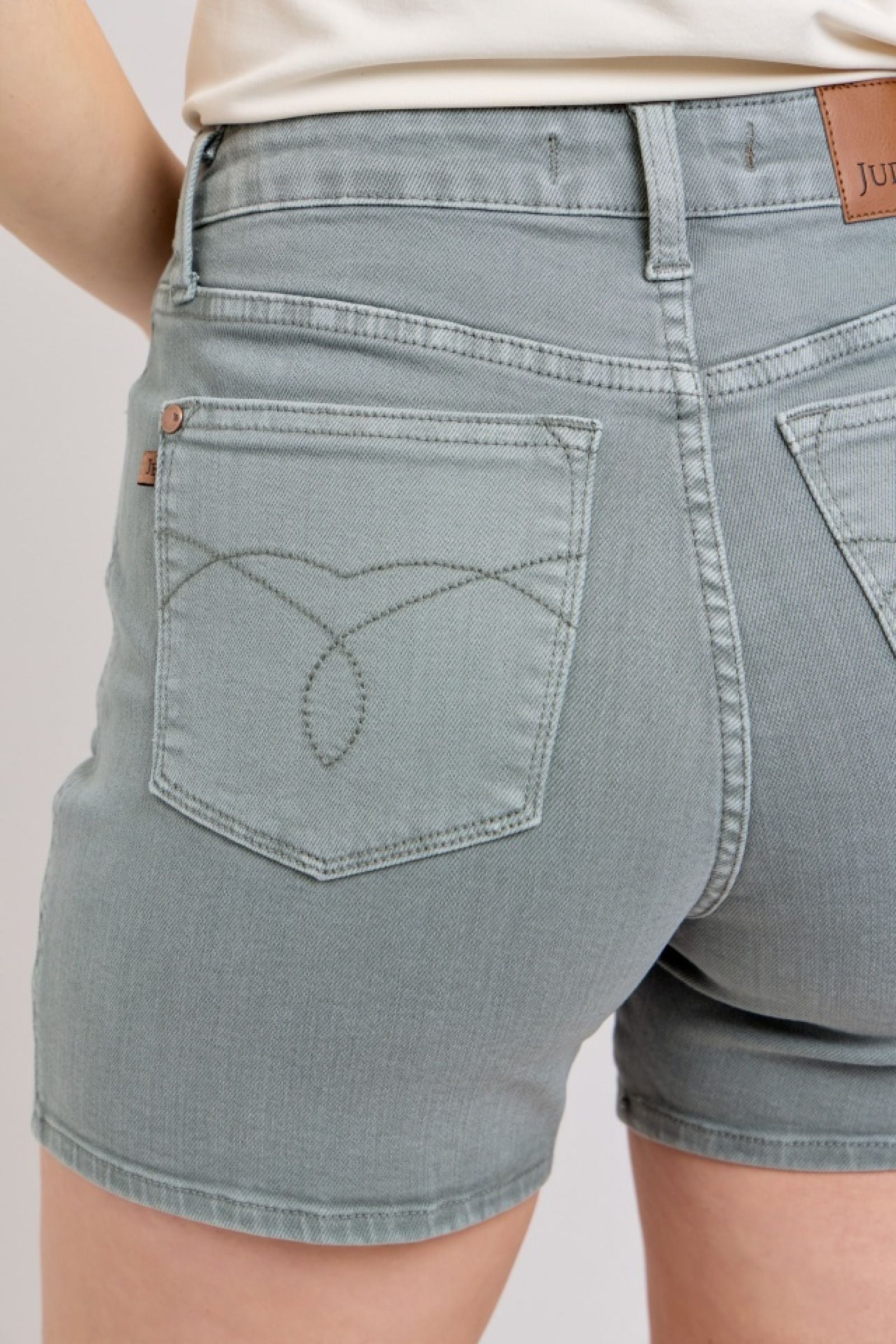 HIGH WAIST STONE BLUE GARMENT DYED BACK POCKET EMBROIDERY DENIM SHORTS JUDY BLUE