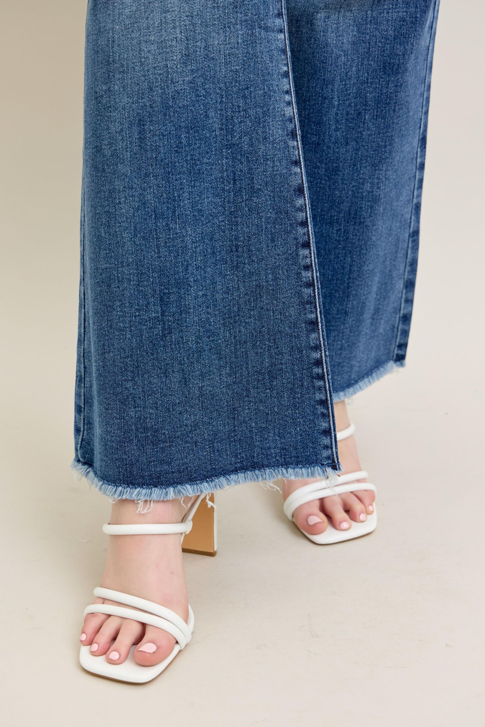 MEDIUM WASH MID RISE VINTAGE WASH FLARE DESTROYED FRAYED HEM JUDY BLUE DENIM-PLUS