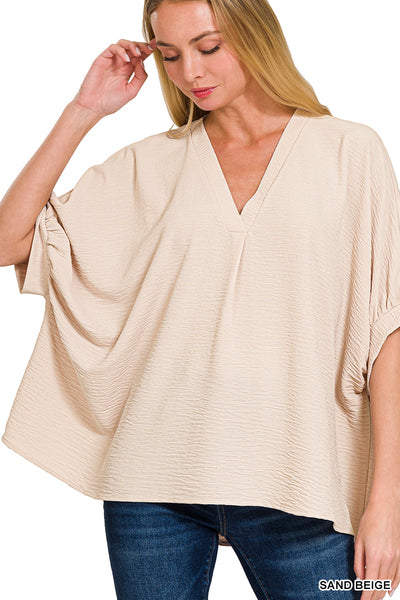 SAND BEIGE WOVEN AIRFLOW V-NECK PUFF HALF SLEEVE TOP -PLUS