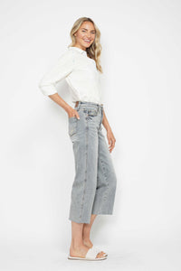 LIGHT WASH MID RISE TUMMY CONTROL RAW HEM WIDE LEG CROPPED JUDY BLUE DENIM