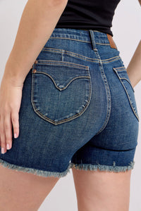 DARKWASH TUMMY CONTROL HIGH WAIST FRAYED HEM SHIELD BACK POCKETS SHORTS JUDY BLUE DENIM-PLUS