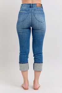HIGH WAIST TUMMY CONTROL MEDIUM WASH BACK SHIELD POCKETS & CUFFED CAPRIS JUDY BLUE DENIM-PLUS