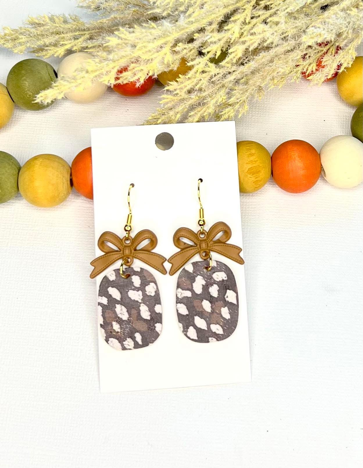 LEOPARD PRINT OVALS LEATHER WITH BROWN METAL BOWS / RIBBONS HANDMADE EARRINGS BY B.O.D