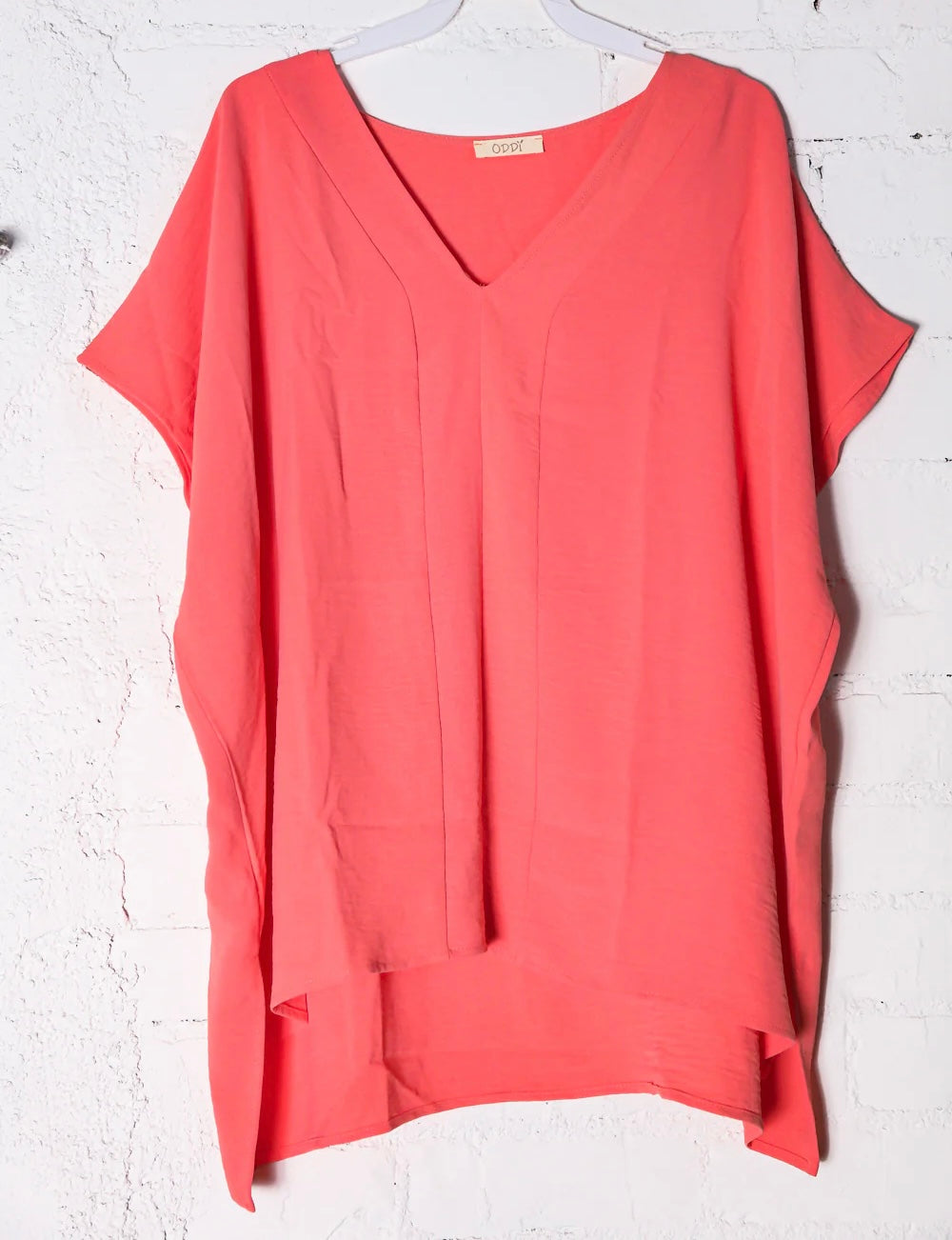 CORAL OUTER SEAM PLEAT DETAIL LOOSE FIT DOLMAN BLOUSE- SALE