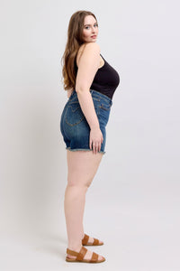 DARKWASH TUMMY CONTROL HIGH WAIST FRAYED HEM SHIELD BACK POCKETS SHORTS JUDY BLUE DENIM-PLUS