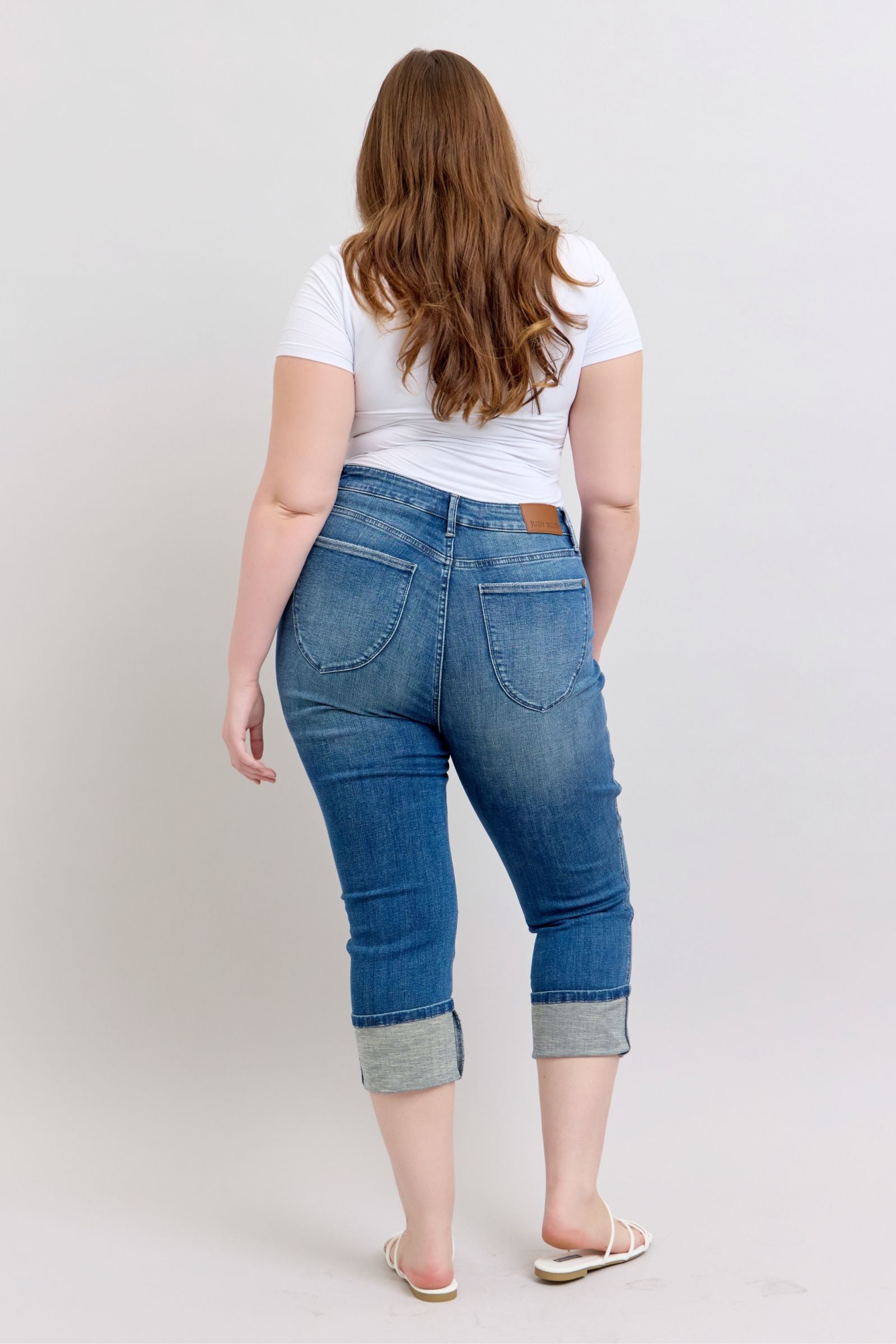 HIGH WAIST TUMMY CONTROL MEDIUM WASH BACK SHIELD POCKETS & CUFFED CAPRIS JUDY BLUE DENIM