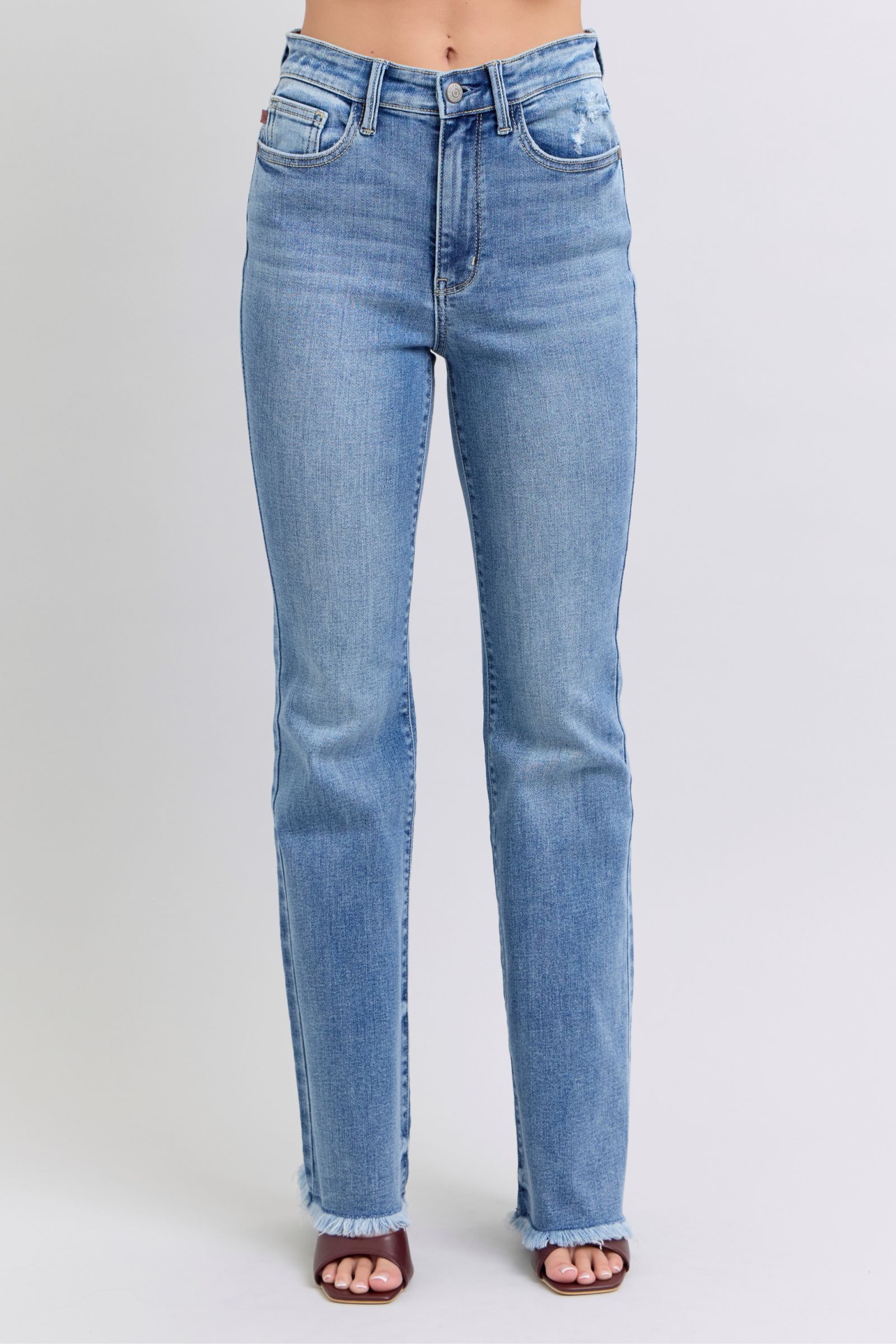 HIGH WAIST MEDIUM WASH BOOTCUT JUDY BLUE DENIM FRAYED HEM