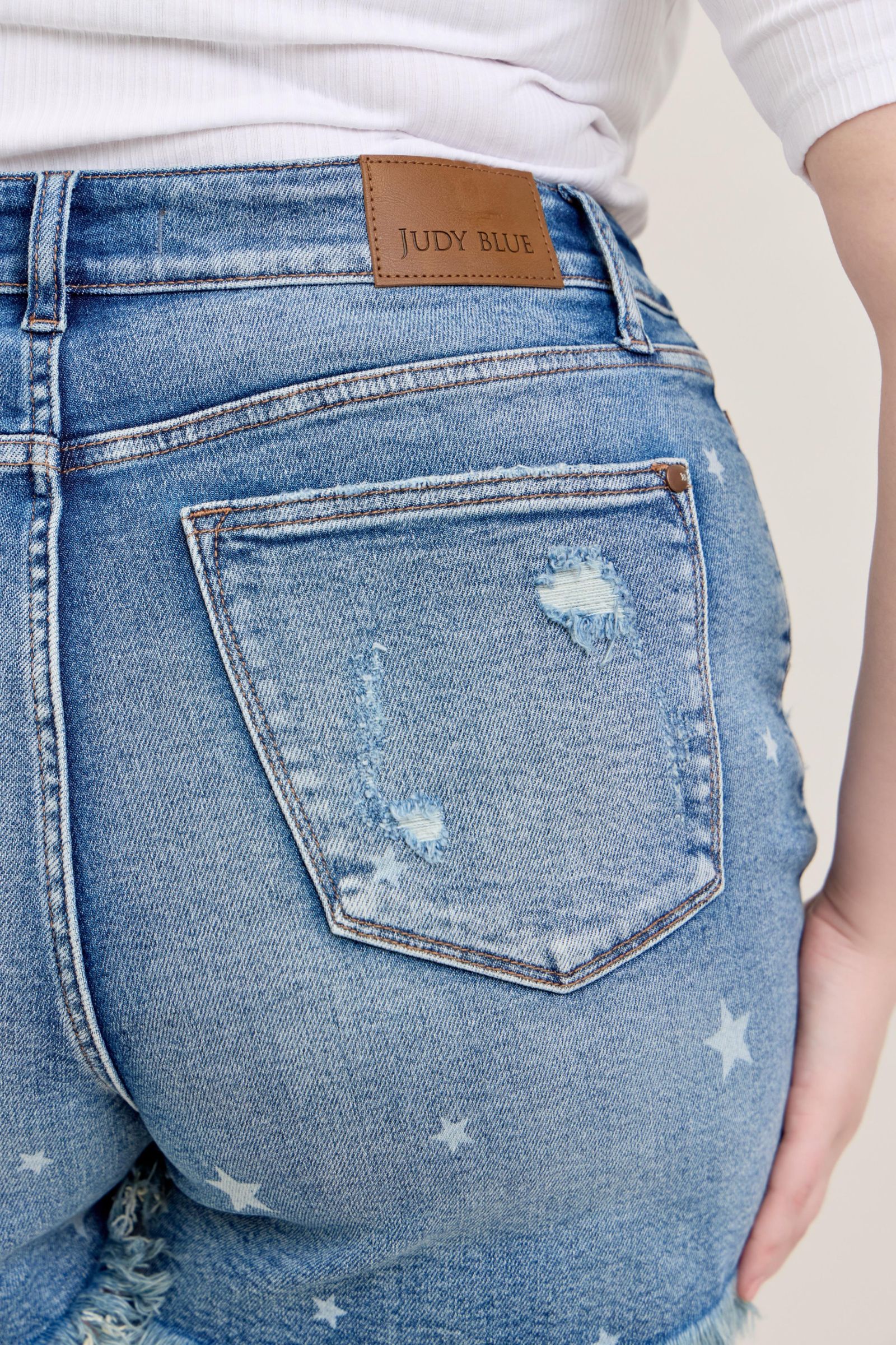 STAR PRINT DESTROYED CUT OFF DENIM SHORTS BY JUDY BLUE MEDIUM WASH HIGH WAIST-PLUS