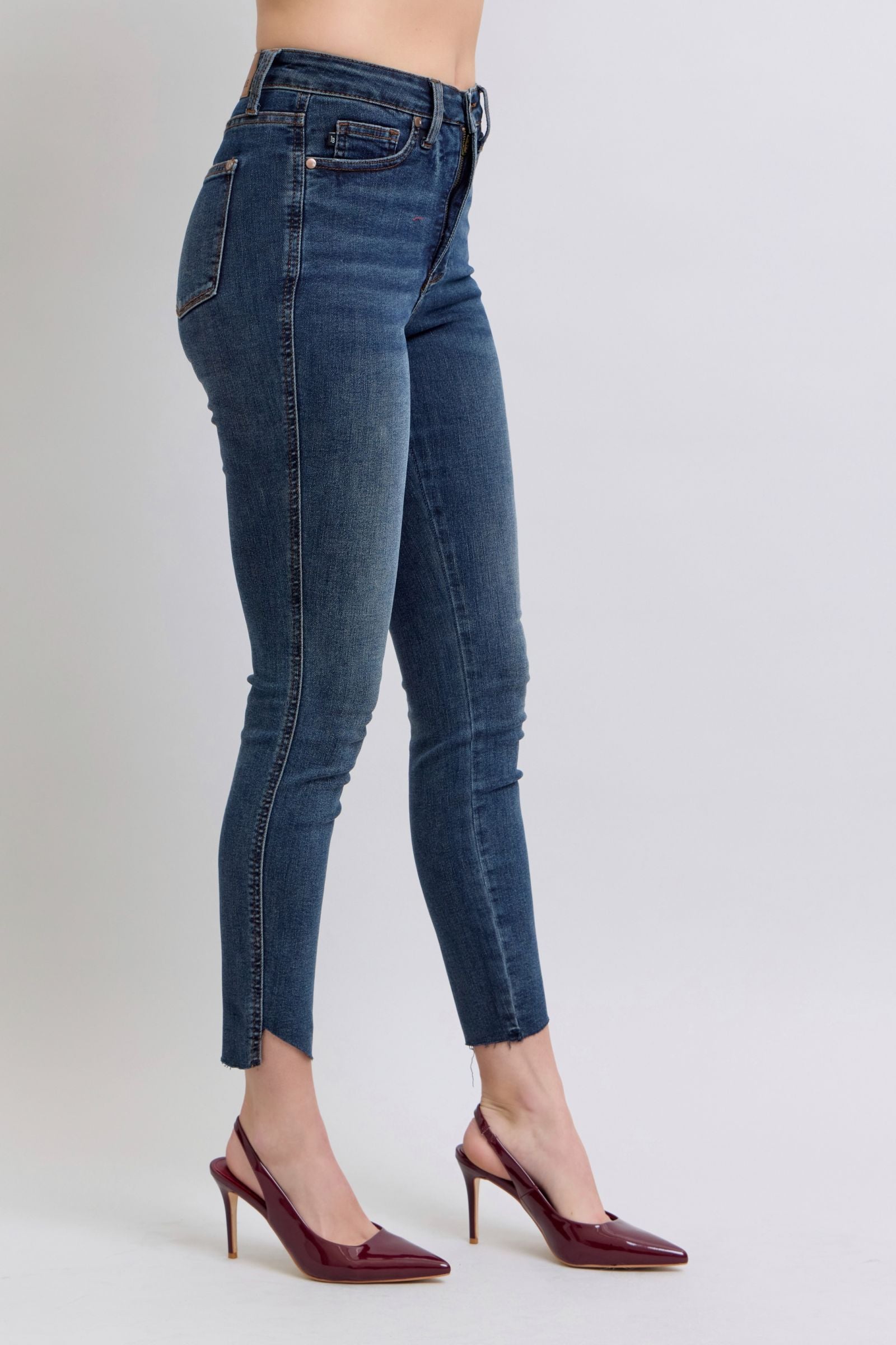 DARKWASH HIGH WAIST TUMMY CONTROL STEP HEM SKINNY JUDY BLUE DENIM-PLUS