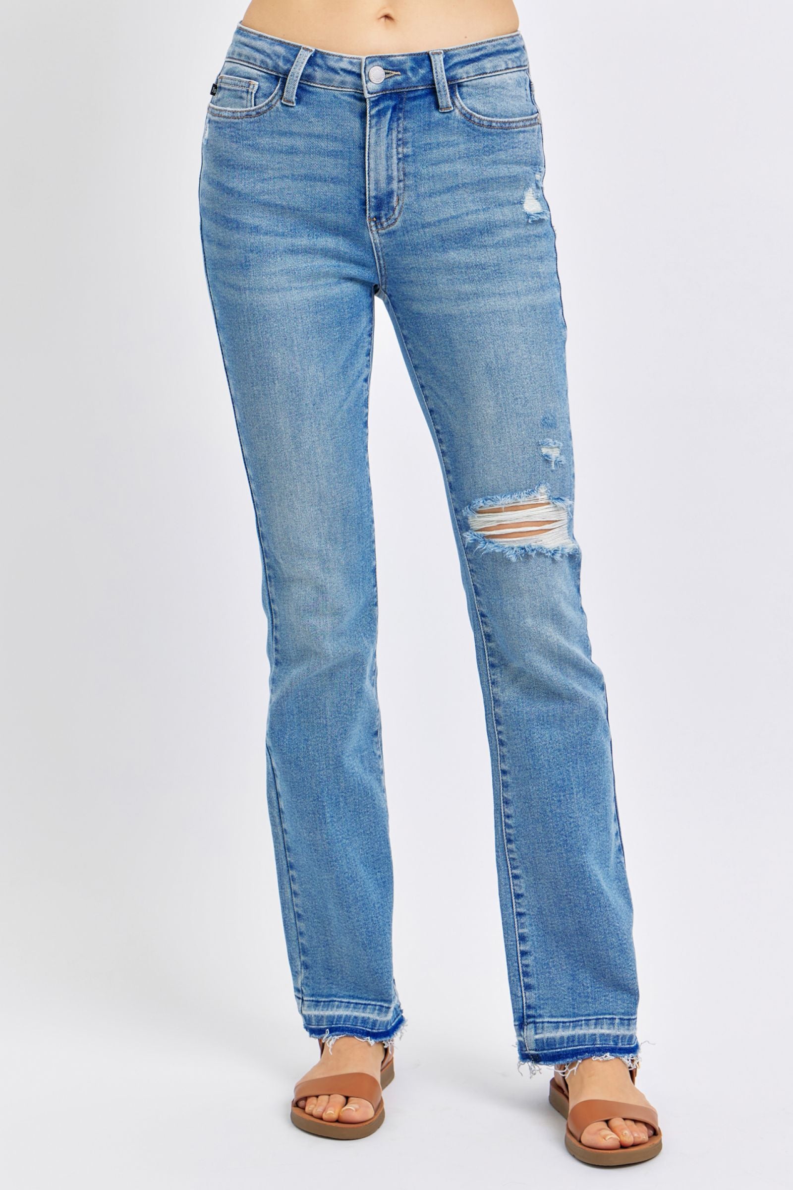 MEDIUM WASH MID RISE DESTROYED RELEASED HEM BOOTCUT JUDY BLUE DENIM