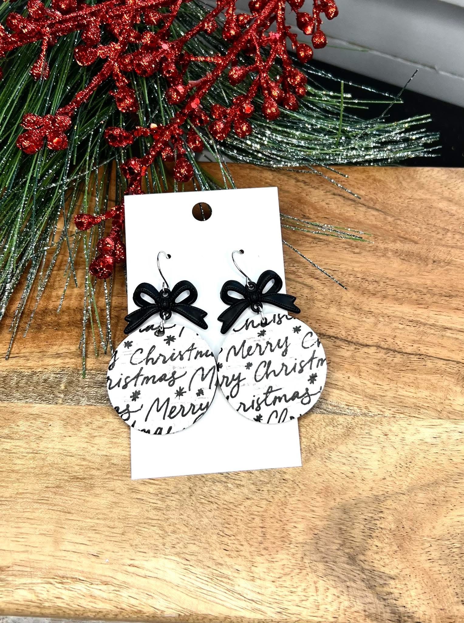 BLACK & WHITE MERRY CHRISTMAS SCRIPT FONT WITH BLACK METAL BOWS HANDMADE EARRINGS BY B.O.D