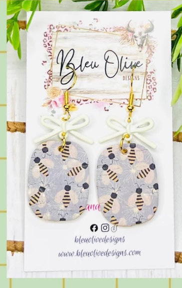 WHITE METAL RIBBON BOW BUMBLEBEE PRINT HANDMADE EARRINGS BY B.O.D