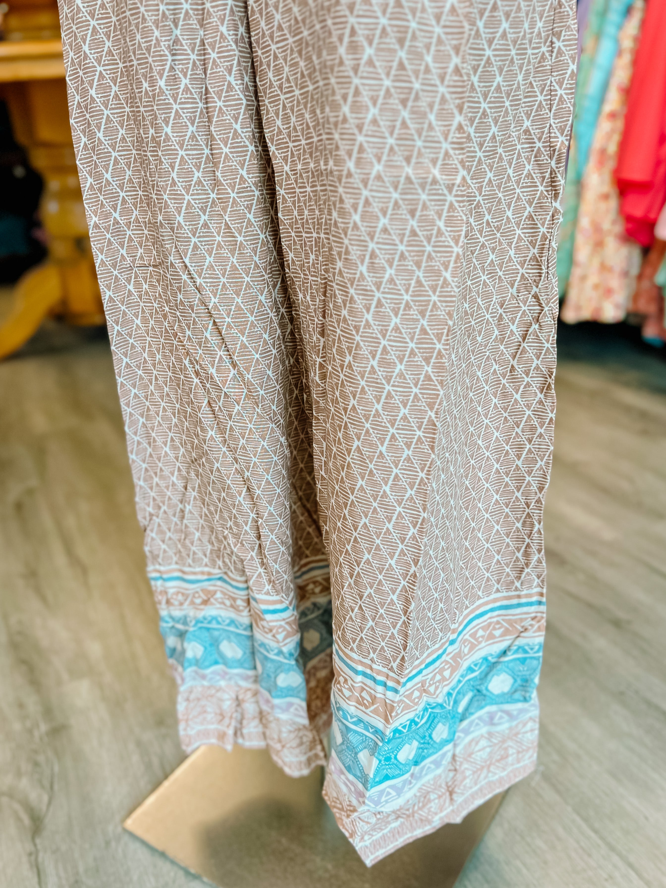 TAUPE PRINTED STRAPPY FLARE PANT JUMPSUIT