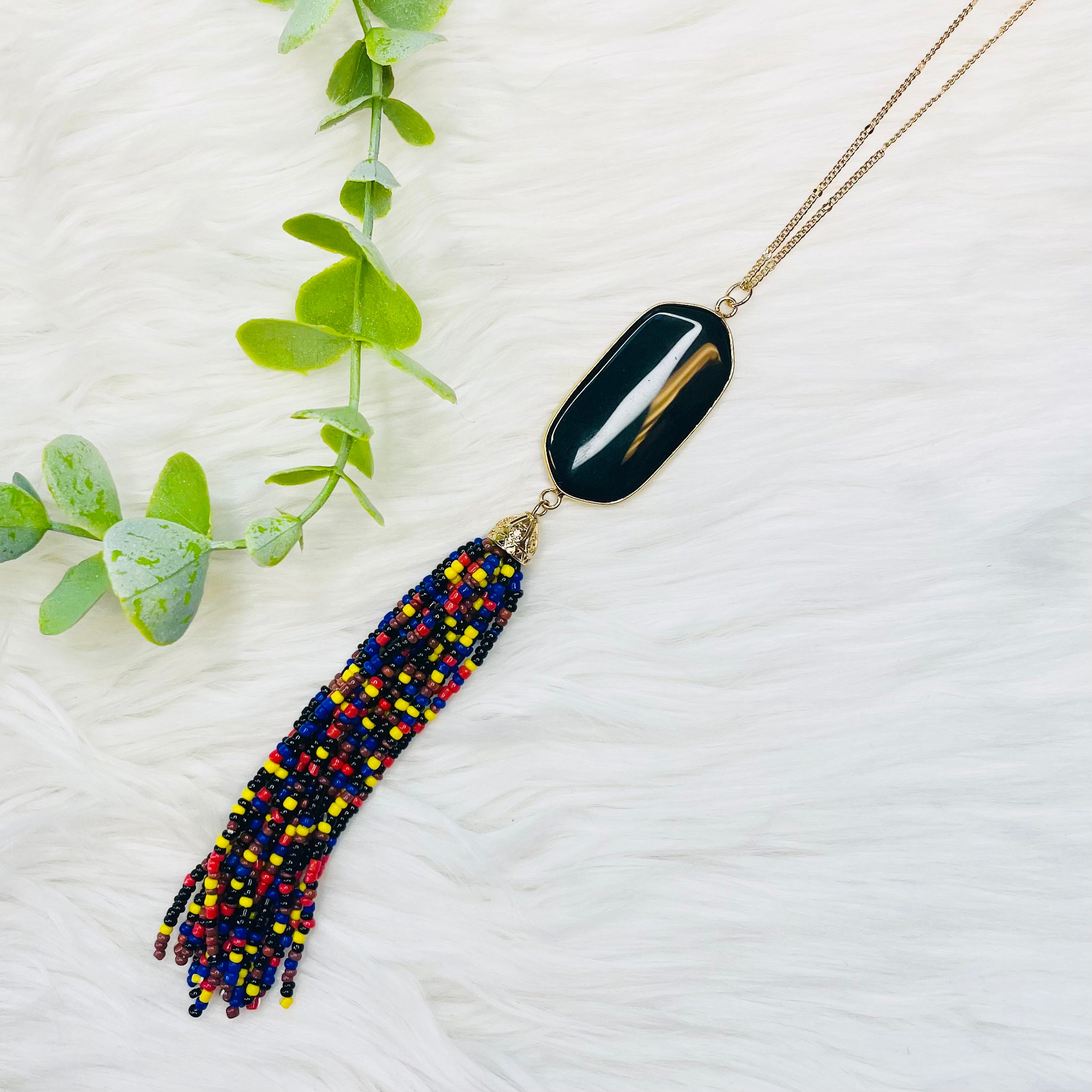 Black Seed Bead Multi Tassel Oval Necklace